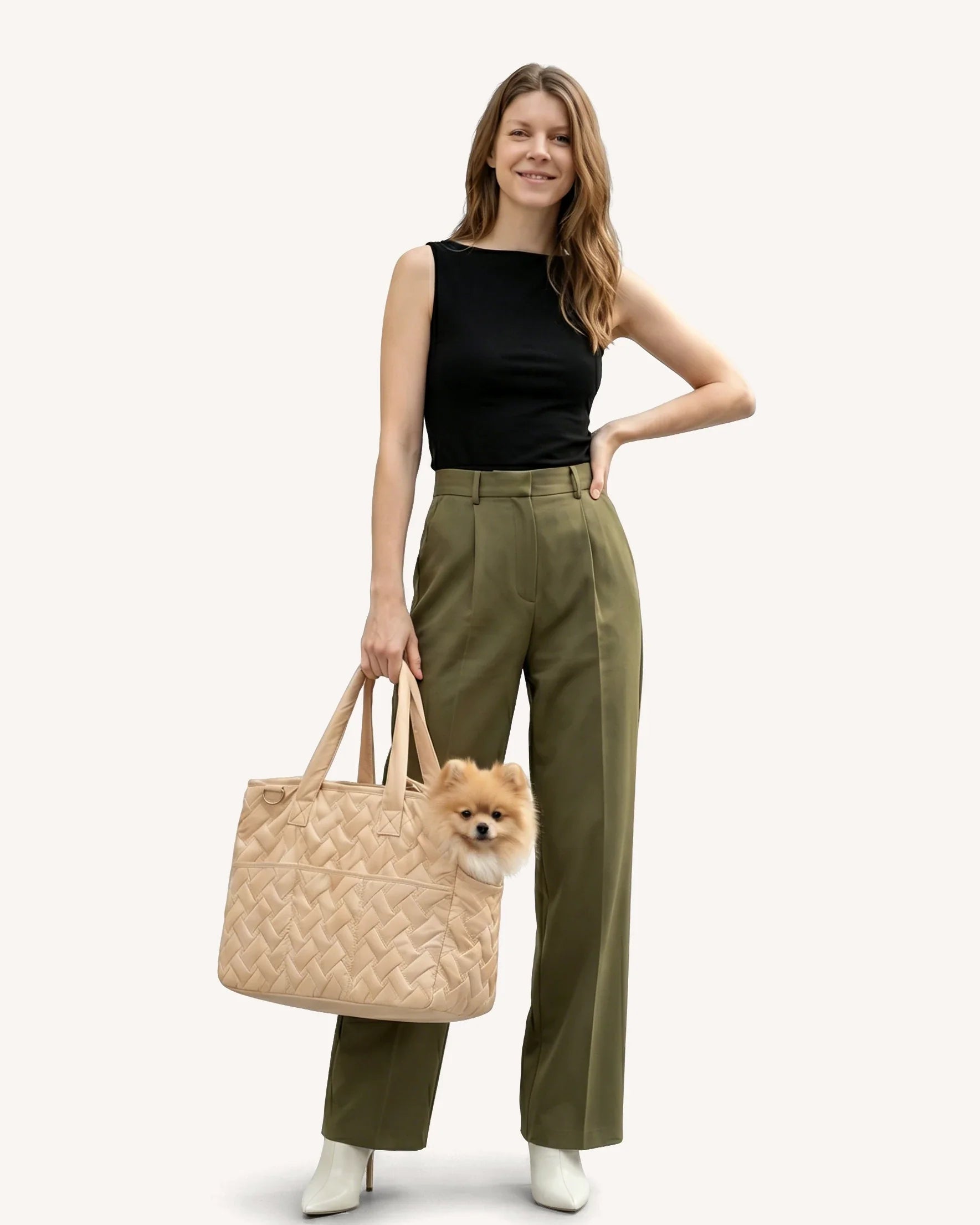 The model is carrying a tote bag, inside which there is a beagle dog