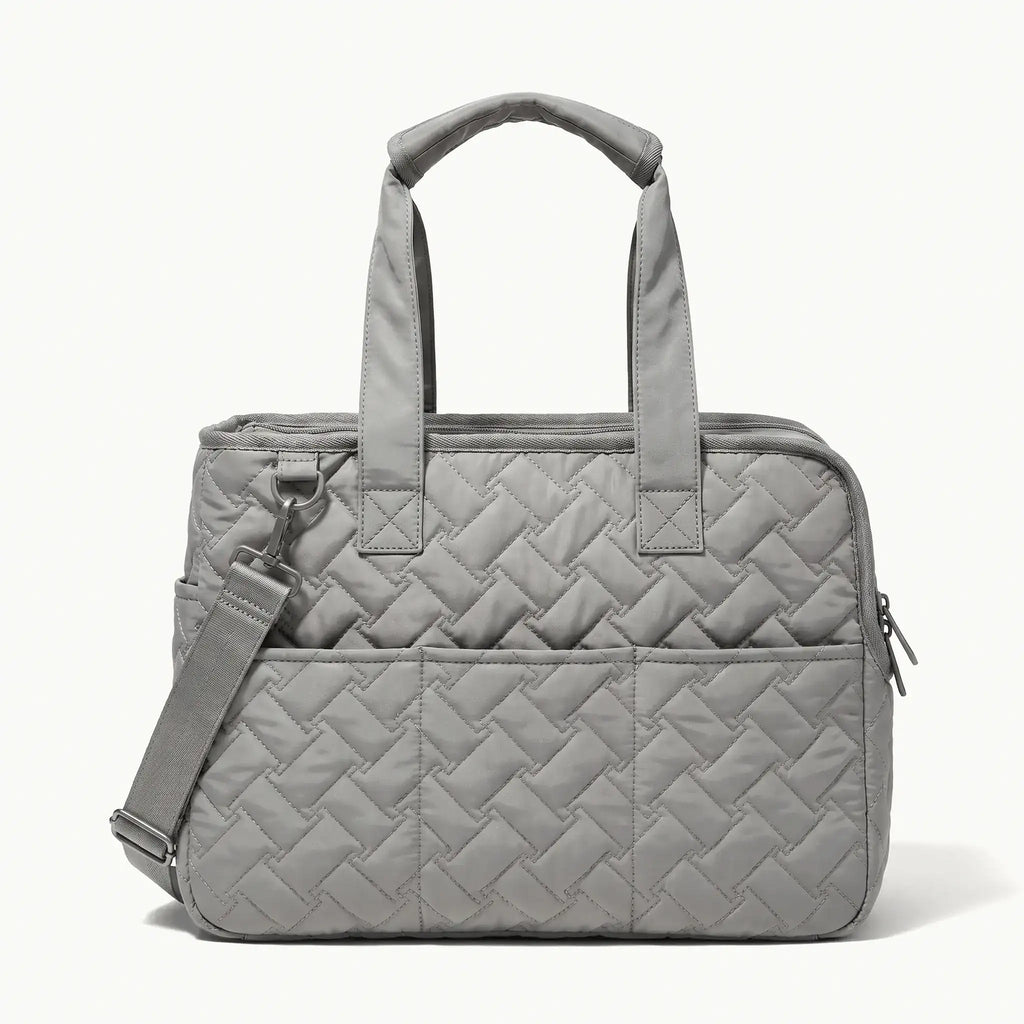 Side view of the gray pet tote bag, featuring a shoulder strap.