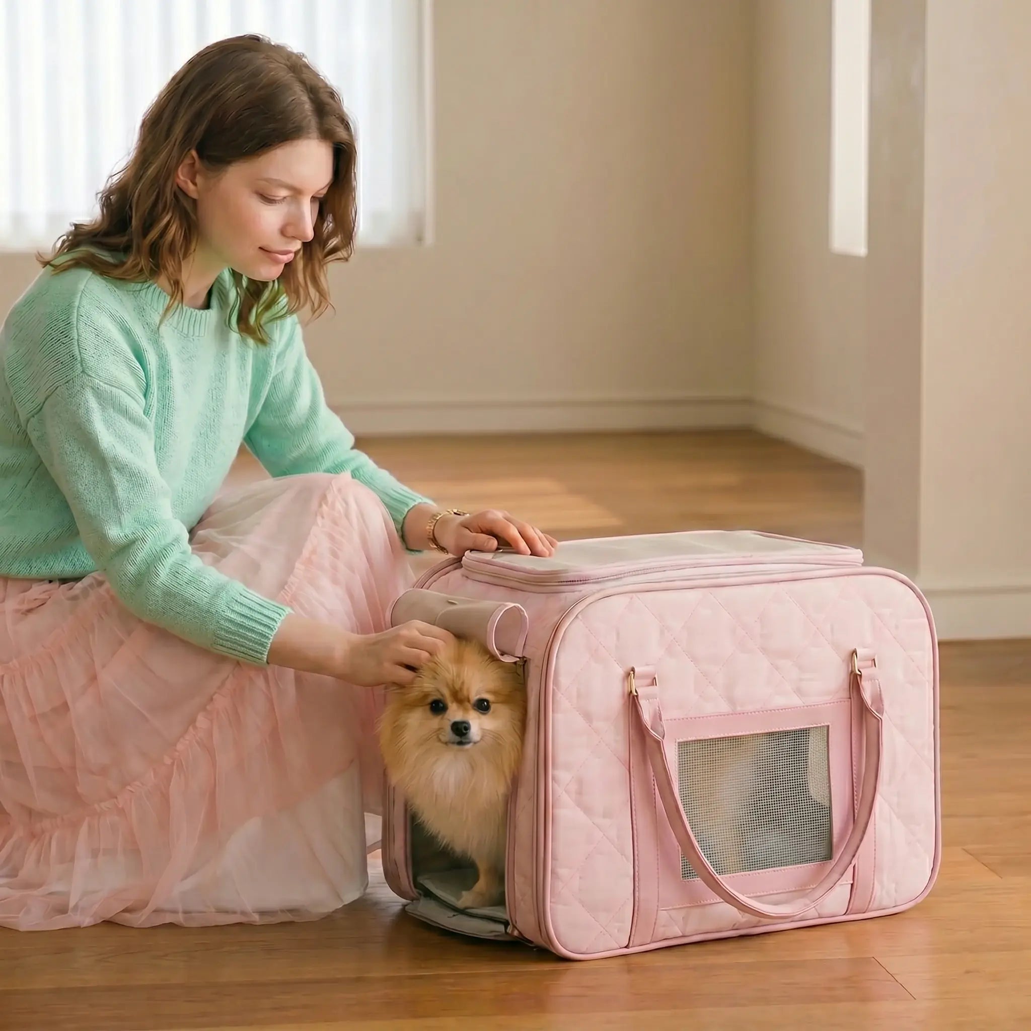 soft-sided carrier placed on the ground, and the dog inside was being stroked by  model